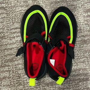 Boys swim shoes size 11-12, black, green, red. Great condition!
